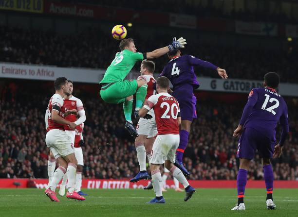 Arsenal and Liverpool denied clear penalties - so why didn't they get them? 4 Arsenal's German goalkeeper Bernd Leno (C) jumps but misses the ball as Liverpool's Dutch defender Virgil van Dijk (2R) has an attempt on goal during the English Premier League football match between Arsenal and Liverpool at the Emirates Stadium in London on November 3, 2018. (Photo by Daniel LEAL-OLIVAS / AFP) / RESTRICTED TO EDITORIAL USE. No use with unauthorized audio, video, data, fixture lists, club/league logos or 'live' services. Online in-match use limited to 120 images. An additional 40 images may be used in extra time. No video emulation. Social media in-match use limited to 120 images. An additional 40 images may be used in extra time. No use in betting publications, games or single club/league/player publications. / (Photo credit should read DANIEL LEAL-OLIVAS/AFP/Getty Images)