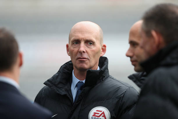 NEWCASTLE UPON TYNE, ENGLAND - OCTOBER 21: Referee Mike Dean looks on prior to the Premier League match between Newcastle United and Crystal Palace...