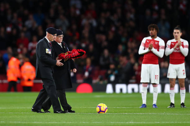 8 things we learned about Arsenal against Wolves 3 LONDON, ENGLAND - NOVEMBER 11: Members of the armed forces bring out a wreath for Remembrance Day prior to the Premier League match between Arsenal FC and Wolverhampton Wanderers at Emirates Stadium on November 11, 2018 in London, United Kingdom. (Photo by Clive Rose/Getty Images)