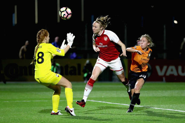 BOREHAMWOOD, ENGLAND - OCTOBER 12:  Louise Quinn of Arsenal scores her side's seventh goal past Sophie Harris of London Bees during the FA WSL Continental Cup match between Arsenal and London Bees on October 12, 2017 in Borehamwood, United Kingdom.  (Photo by Linnea Rheborg/Getty Images)