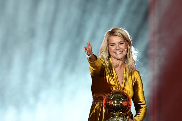 Olympique Lyonnais' Norwegian forward Ada Hegerberg gestures after receiving the 2018 FIFA Women's Ballon d'Or award for best player of the year du...