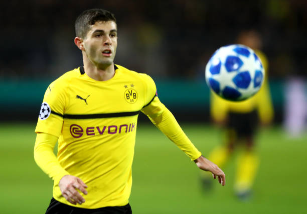 DORTMUND, GERMANY - NOVEMBER 28: Christian Pulisic of Dortmund runs with the ball during the Group A match of the UEFA Champions League between Bor...
