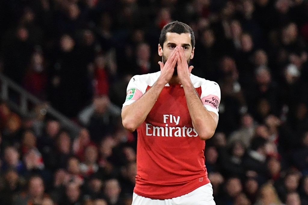 Arsenal's Armenian midfielder Henrikh Mkhitaryan reacts during the English League Cup quarter-final football match between Arsenal and Tottenham Ho...