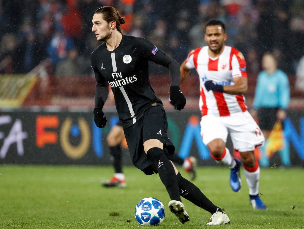 BELGRADE, SERBIA - DECEMBER 11: Adrien Rabiot (L) of Paris Saint-Germain in action during the UEFA Champions League Group C match between Red Star ...