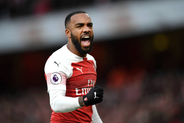 LONDON, ENGLAND - DECEMBER 02: Alexandre Lacazette of Arsenal celebrates during the Premier League match between Arsenal FC and Tottenham Hotspur a...