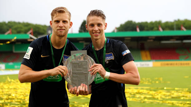 OBERHAUSEN, GERMANY - MAY 27: (L-R) Arne Maier and Palko Dardai of Berlin celebrate wit. He German trophy after winning 3-1 the German A Juniors Championship Final between FC Schalke 04 U19 and Hertha BSC Berlin U19 at Stadion Niederrhein on May 27, 2018 in Oberhausen, Germany. (Photo by Christof Koepsel/Bongarts/Getty Images)