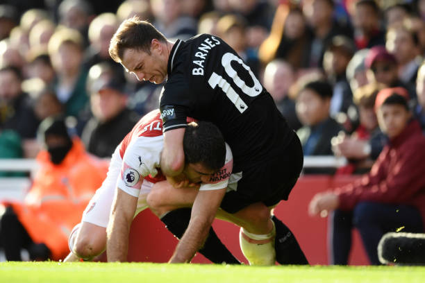 Cheats! Sean Dyche and media show their hypocrisy after Arsenal win 5 LONDON, ENGLAND - DECEMBER 22: Sokratis Papastathopoulos of Arsenal clashes with Ashley Barnes of Burnley during the Premier League match between Arsenal FC and Burnley FC at Emirates Stadium on December 22, 2018 in London, United Kingdom. (Photo by Shaun Botterill/Getty Images)