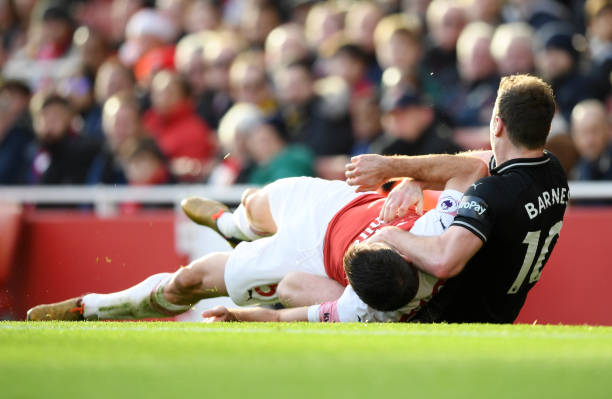 Cheats! Sean Dyche and media show their hypocrisy after Arsenal win 6 LONDON, ENGLAND - DECEMBER 22: Sokratis Papastathopoulos of Arsenal clashes with Ashley Barnes of Burnley during the Premier League match between Arsenal FC and Burnley FC at Emirates Stadium on December 22, 2018 in London, United Kingdom. (Photo by Shaun Botterill/Getty Images)
