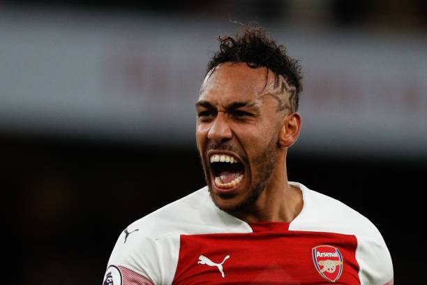 Arsenal's Gabonese striker Pierre-Emerick Aubameyang celebrates on the pitch after the English Premier League football match between Arsenal and To...