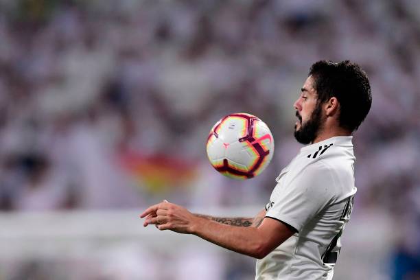 Real Madrid's Spanish midfielder Isco controls the ball during the Spanish league football match between Real Madrid CF and RCD Espanyol at the San...