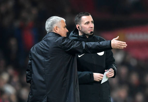 MANCHESTER, ENGLAND - DECEMBER 05: Jose Mourinho, Manager of Manchester United speaks with Fourth Official Chris Kavanagh during the Premier League...