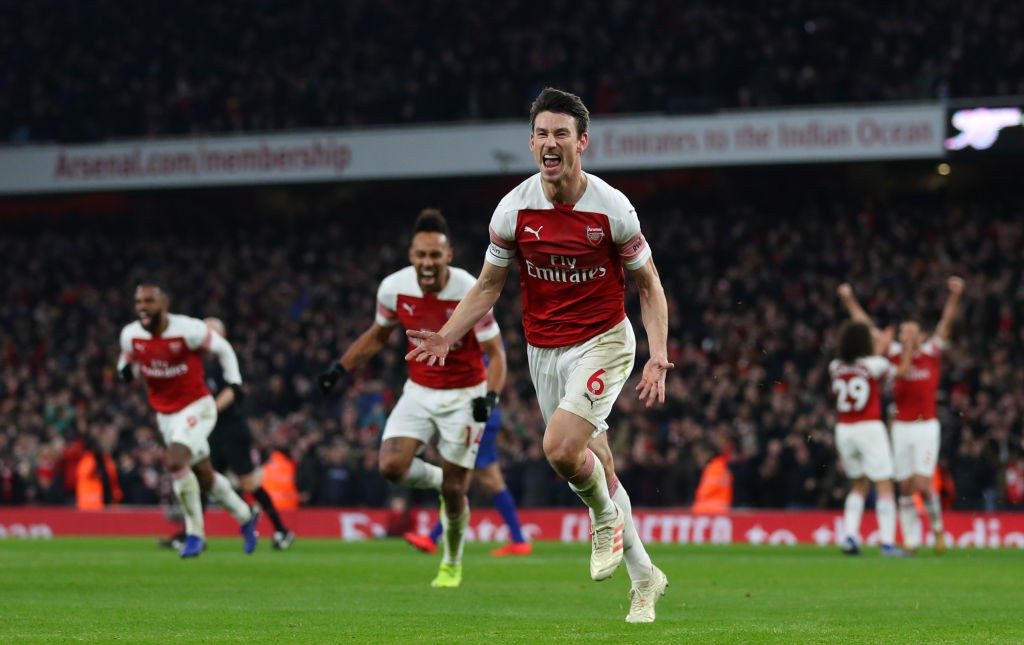 LONDON, ENGLAND - JANUARY 19: Laurent Koscielny of Arsenal celebrates after he scores his sides second goal during the Premier League match between Arsenal FC and Chelsea FC at Emirates Stadium on January 19, 2019 in London, United Kingdom. (Photo by Catherine Ivill/Getty Images)