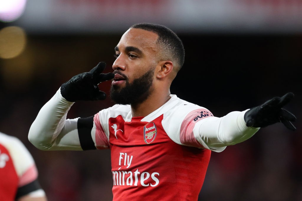 LONDON, ENGLAND - JANUARY 01: Alexandre Lacazette of Arsenal celebrates after scoring his team's second goal during the Premier League match betwee...