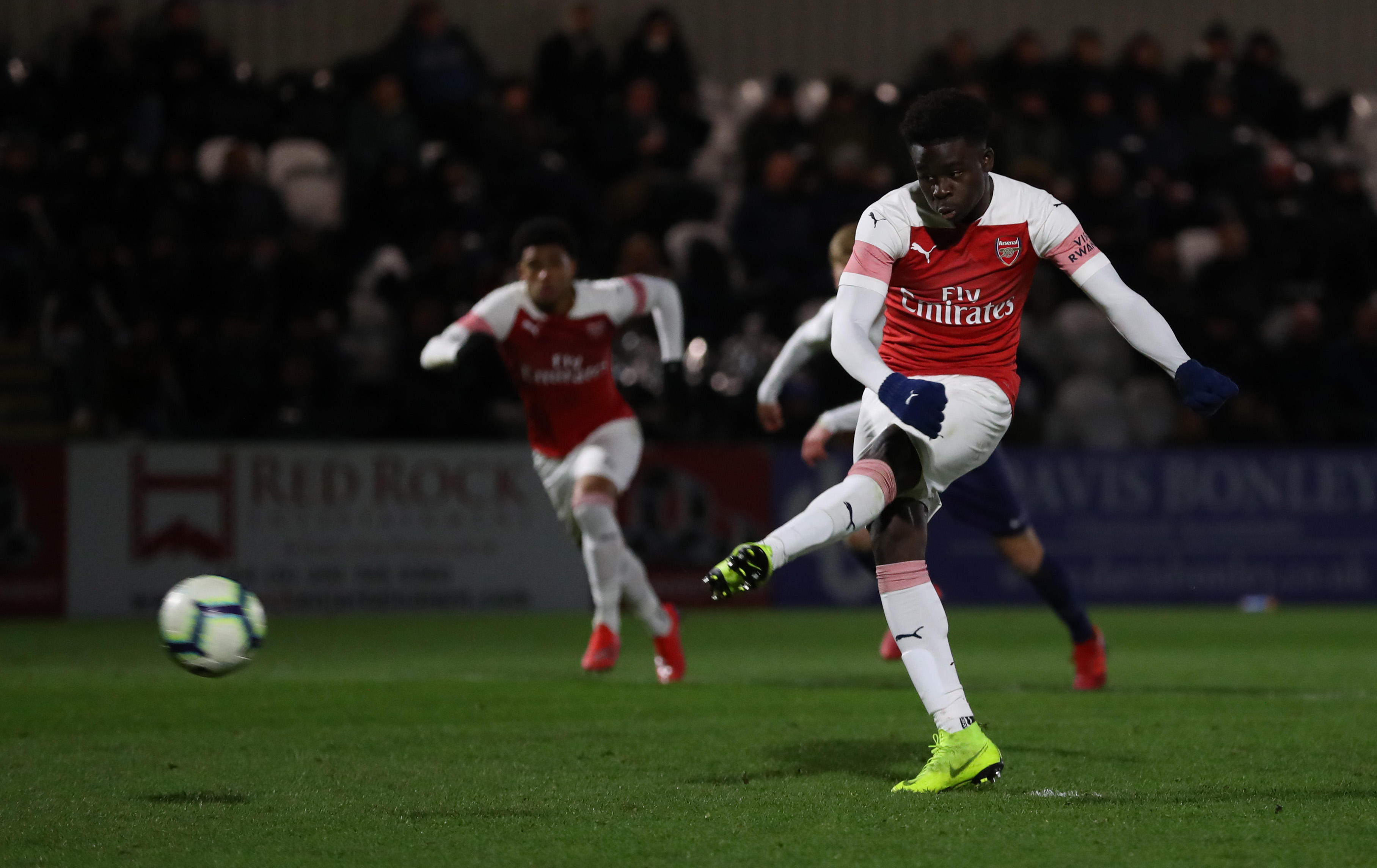 Bukayo Saka of Arsenal scores his sides second goal from the penalty spot during the FA Youth Cup Fourth Round between Arsenal and Tottenham Hotspu...