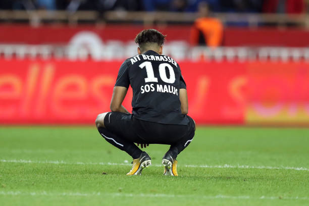 Caen midfielder Youssef Ait Bennasser reacts at the end of the French L1 football match Monaco vs Caen on October 21, 2017 at the Louis II stadium ...