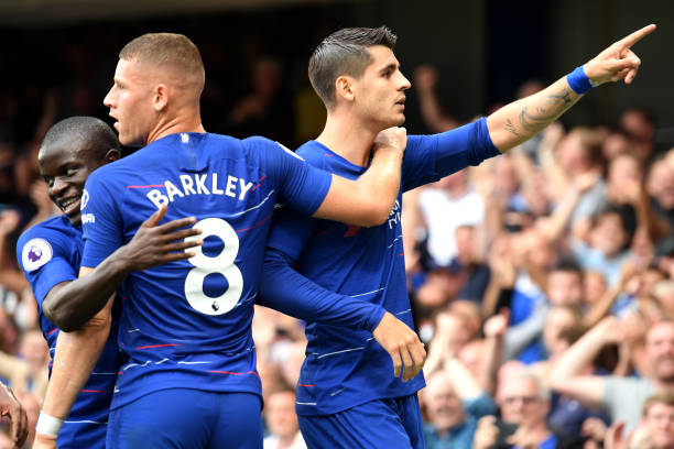 LONDON, ENGLAND - AUGUST 18: Alvaro Morata of Chelsea celebrates after scoring his team's second goal with team mates Ross Barkley and N'golo Kante during the Premier League match between Chelsea FC and Arsenal FC at Stamford Bridge on August 18, 2018 in London, United Kingdom. (Photo by Mike Hewitt/Getty Images)