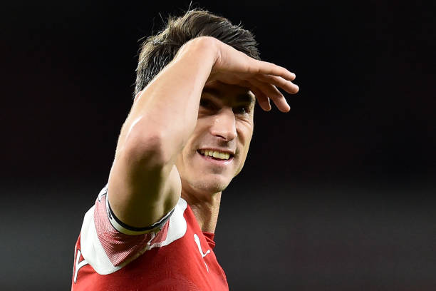 Arsenal's French defender Laurent Koscielny applauds the fans following the English Premier League football match between Arsenal and Fulham at the...
