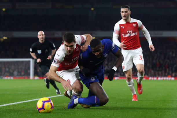 Arsenal prove they’re possibly, probably, not total morons 6 LONDON, ENGLAND - JANUARY 19: Antonio Ruediger of Chelsea battles for possession with Sokratis Papastathopoulos of Arsenal during the Premier League match between Arsenal FC and Chelsea FC at Emirates Stadium on January 19, 2019 in London, United Kingdom. (Photo by Clive Rose/Getty Images)