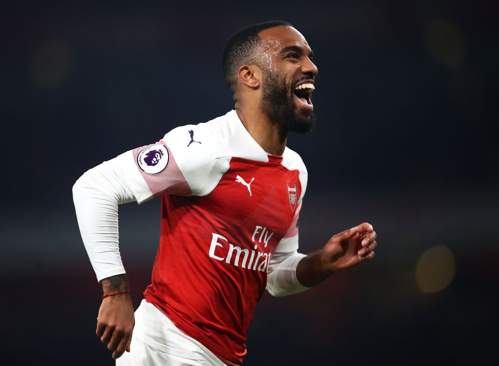 LONDON, ENGLAND - FEBRUARY 27: Alexandre Lacazette of Arsenal celebrates after scoring his team's fifth goal during the Premier League match betwee...