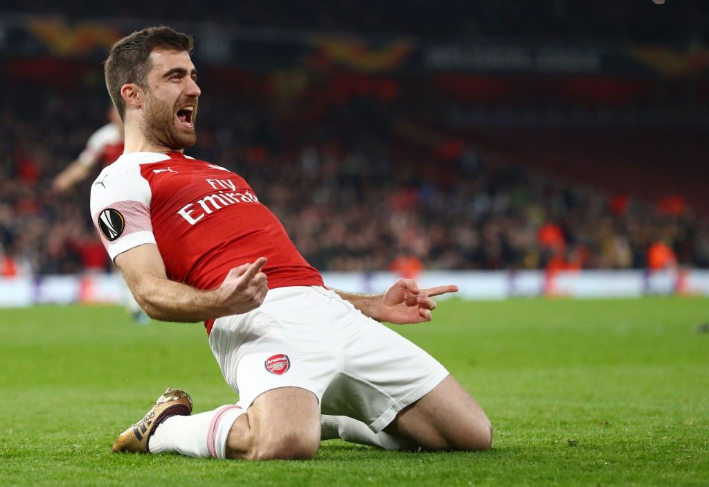 LONDON, ENGLAND - FEBRUARY 21: Sokratis Papastathopoulos of Arsenal celebrates after scoring his team's third goal during the UEFA Europa League Round of 32 Second Leg match between Arsenal and BATE Borisov at Emirates Stadium on February 21, 2019 in London, United Kingdom. (Photo by Clive Rose/Getty Images)