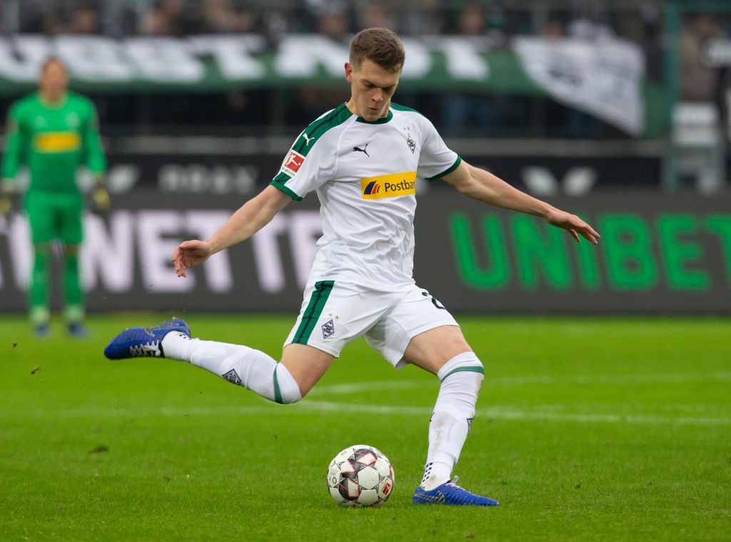 MOENCHENGLADBACH, GERMANY - JANUARY 26: Matthias Ginter of Moenchengladbach passes the ball during the Bundesliga match between Borussia Moenchengl...