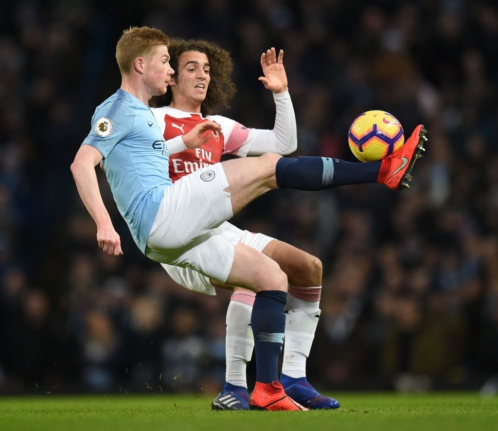 Player ratings vs Manchester City: Arsenal suffer predictable 3-1 defeat at the Etihad 3 Manchester City's Belgian midfielder Kevin De Bruyne (L) vies with Arsenal's French midfielder Matteo Guendouzi (R) during the English Premier League football match between Manchester City and Arsenal at the Etihad Stadium in Manchester, north west England, on February 3, 2019. (Photo by OLI SCARFF / AFP / Getty Images)