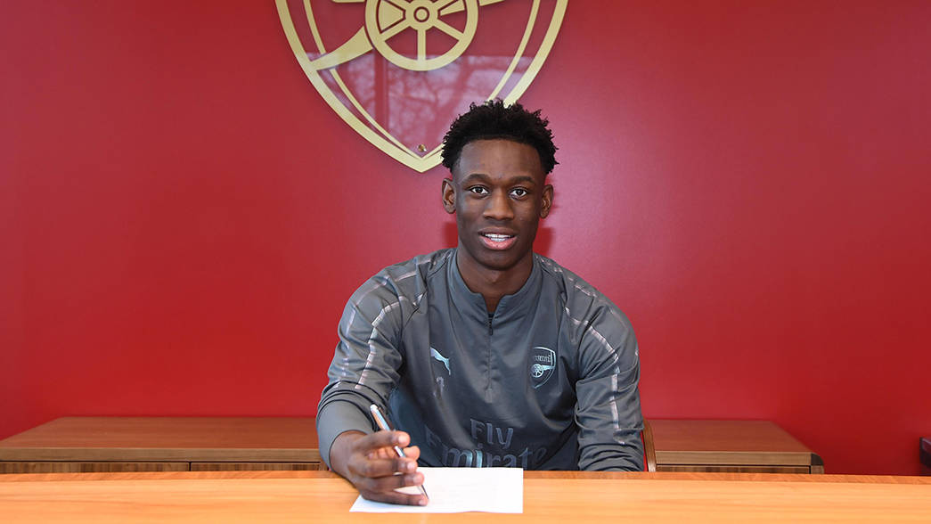 ST ALBANS, ENGLAND - FEBRUARY 08: Flo Balogun signs a new Arsenal contract at London Colney on February 08, 2019 in St Albans, England. (Photo by S...