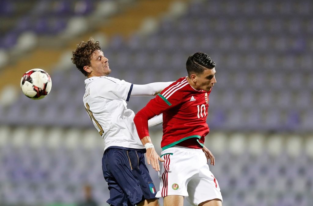 BUDAPEST, HUNGARY - OCTOBER 5: Dominik Szoboszlai (R) of Hungary and Manuel Locatelli (L) in action during the International Friendly match between...