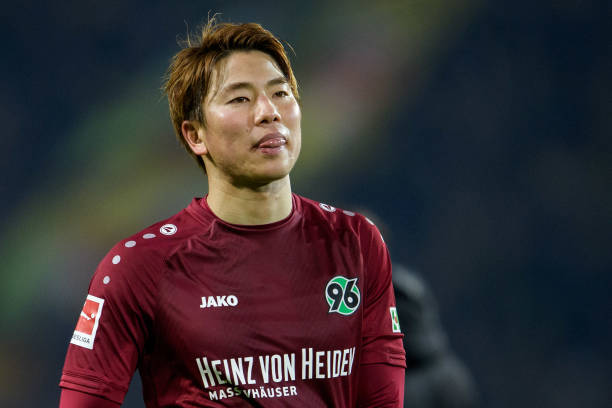 DORTMUND, GERMANY - JANUARY 26: Takuma Asano of Hannover reacts after their loss during the Bundesliga match between Borussia Dortmund and Hannover...