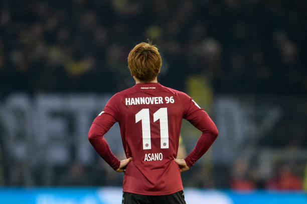 DORTMUND, GERMANY - JANUARY 26: Takuma Asano of Hannover seen from the back during the Bundesliga match between Borussia Dortmund and Hannover 96 a...