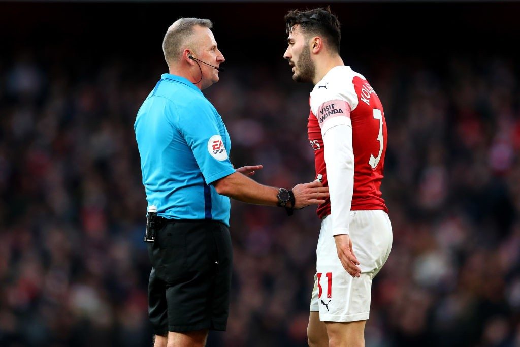Unai Emery to make 3 changes: Predicted Arsenal lineup vs Leicester City 3 LONDON, ENGLAND - MARCH 10: Referee Jonathon Moss talks to Sead Kolasinac of Arsenal during the Premier League match between Arsenal FC and Manchester United at Emirates Stadium on March 10, 2019 in London, United Kingdom. (Photo by Catherine Ivill/Getty Images)