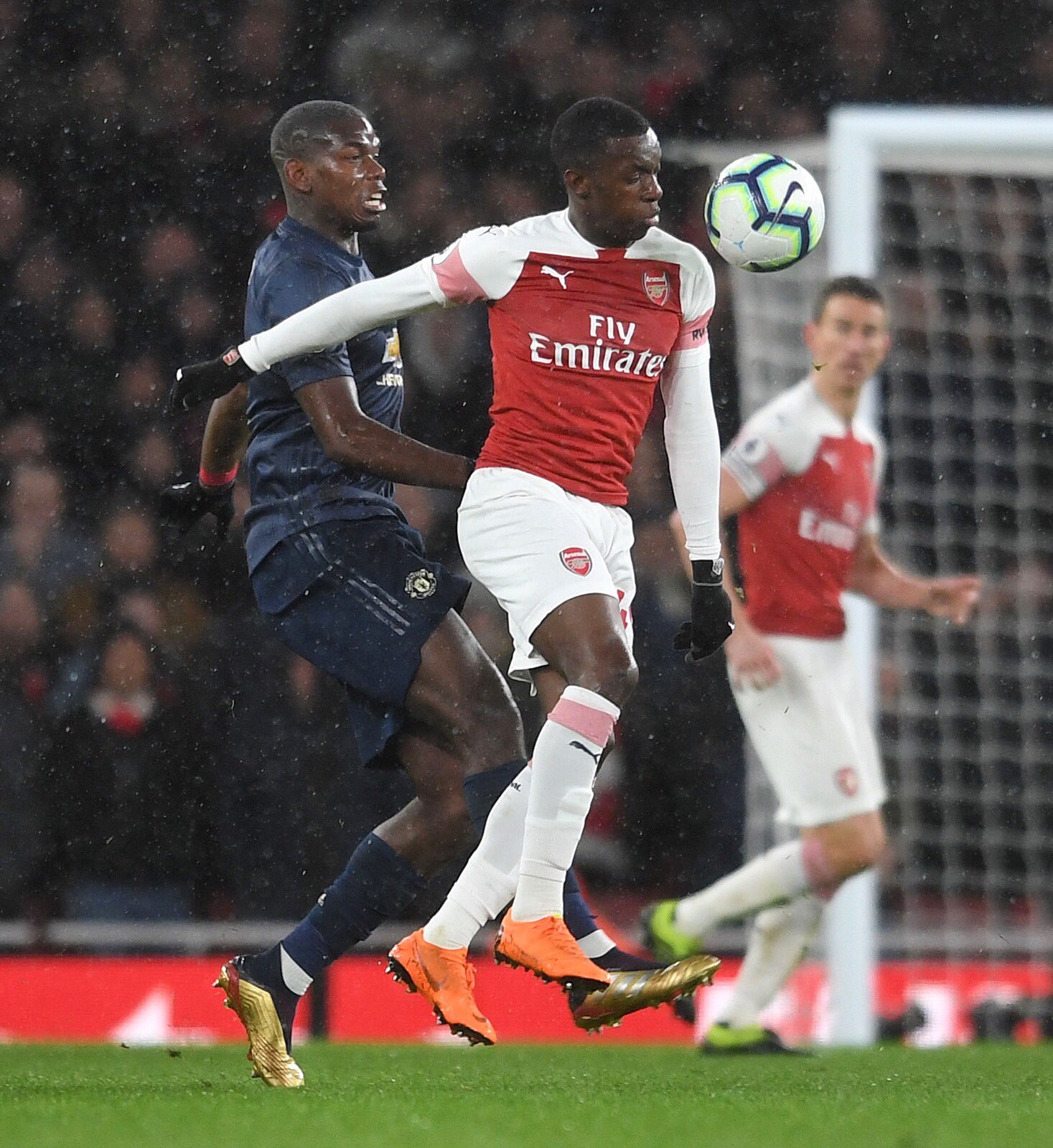 Eddie Nketiah battling for possession with Paul Pogba (Photo via Twitter / EddieNketiah9)