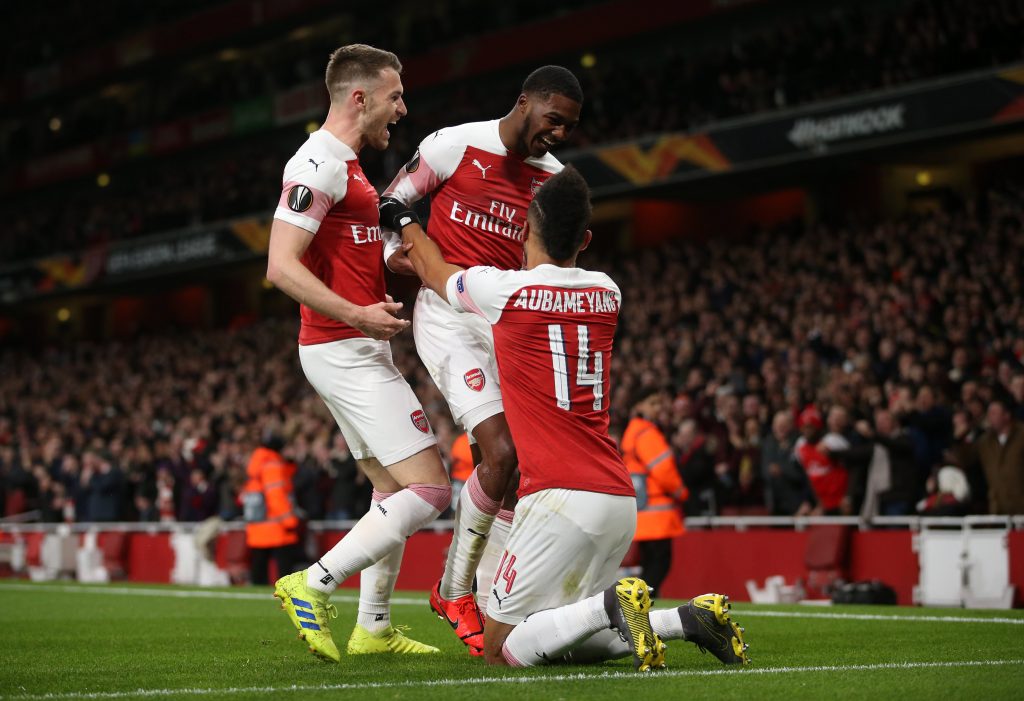 LONDON, ENGLAND - MARCH 14: Ainsley Maitland-Niles of Arsenal  celebrates with teammates Pierre-Emerick Aubameyang and Aaron Ramsey after scoring his team's second goal during the UEFA Europa League Round of 16 Second Leg match between Arsenal and Stade Rennais at Emirates Stadium on March 14, 2019, in London, England. (Photo by Alex Morton/Getty Images)