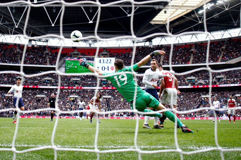 LONDON, ENGLAND - MARCH 02: Bernd Leno of Arsenal makes a save during the Premier League match between Tottenham Hotspur and Arsenal FC at Wembley ...