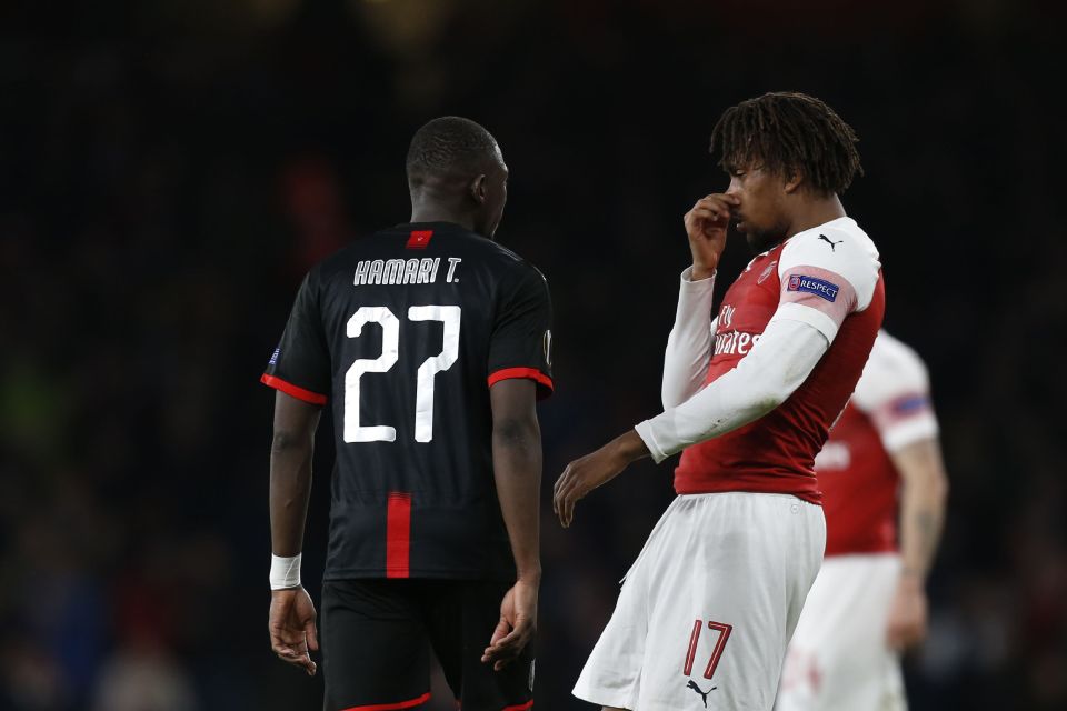 Rennes' Malian defender Hamari Traore (L) and Arsenal's Nigerian striker Alex Iwobi have a confrontation during the UEFA Europa League Round of 16 ...