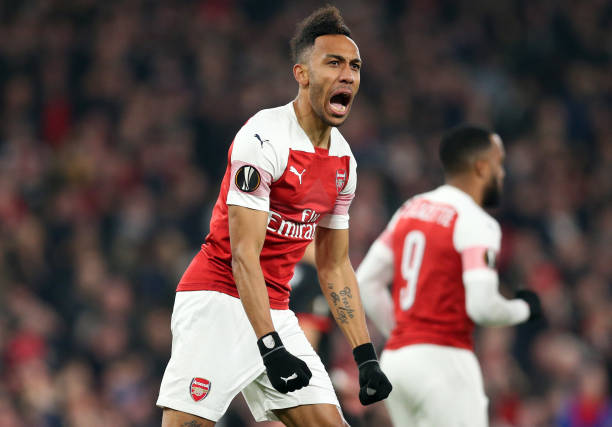 LONDON, ENGLAND - MARCH 14: Pierre-Emerick Aubameyang of Arsenal celebrates after scoring his team's first goal during the UEFA Europa League Round of 16 Second Leg match between Arsenal and Stade Rennais at Emirates Stadium on March 14, 2019 in London, England. (Photo by Alex Morton/Getty Images)