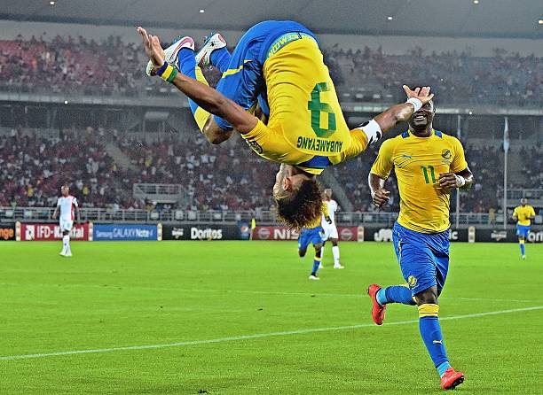 Gabon's forward Pierre-Emerick Aubameyang celebrates after scoring a goal during the 2015 African Cup of Nations group A football match between Burkina Faso and Gabon at Bata Stadium in Bata on January 17, 2015. AFP PHOTO / CARL DE SOUZA 