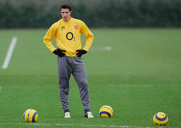 LONDON - DECEMBER 06: Robin van Persie of Arsenal looks on during the training session before their Champions League group stage match against Ajax on December 6, 2005 at London Colney, England. (Photo by Clive Rose/Getty Images)