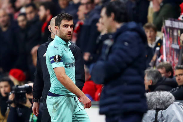 RENNES, FRANCE - MARCH 07: Sokratis Papastathopoulos of Arsenal looks towards his manager Unai Emery as he leaves the pitch after receiving a red c...