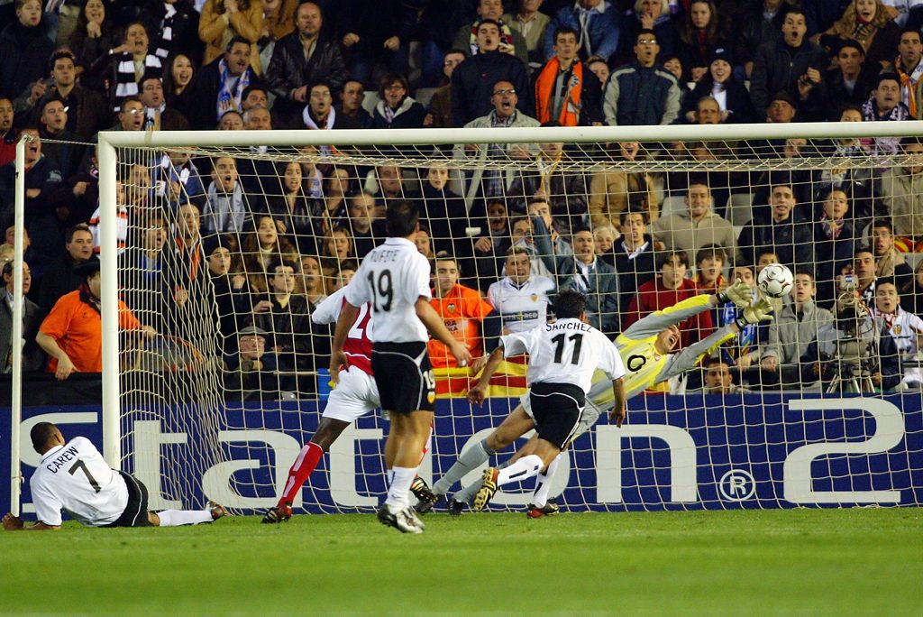 Arsenal have an old score to settle in Valencia 2 VALENCIA - MARCH 19: John Carew of Valencia scores the second and decisive goal during the UEFA Champions League Second Phase Group B match between Valencia and Arsenal held on March 19, 2003 at Mestalla Camp Del Valencia, in Valencia, Spain. Valencia won the match 2-1. (Photo by Ben Radford/Getty Images)