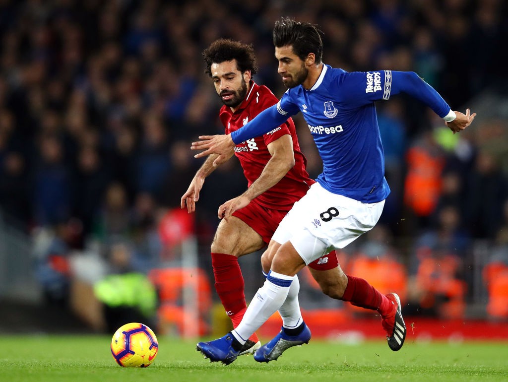 LIVERPOOL, ENGLAND - DECEMBER 02: Andre Gomes of Everton is closed down by Mohamed Salah of LiverpLoris Karius of Liverpool during the Premier Leag...
