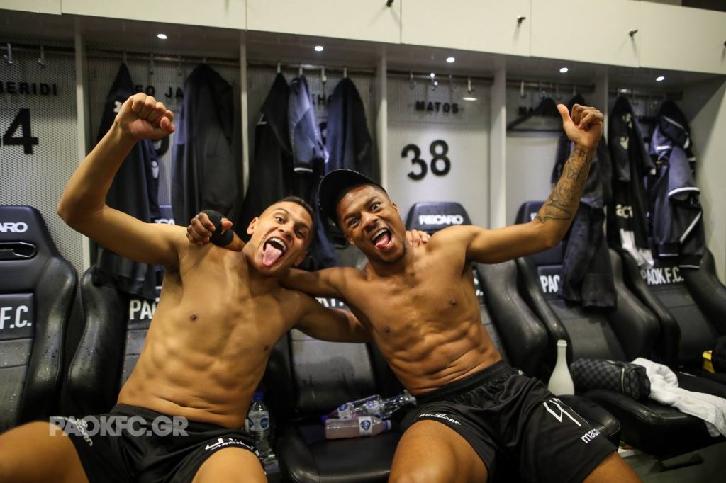 Chuba Akpom poses with a teammate after winning the Greek Superleague (Photo via PAOKFC.GR)