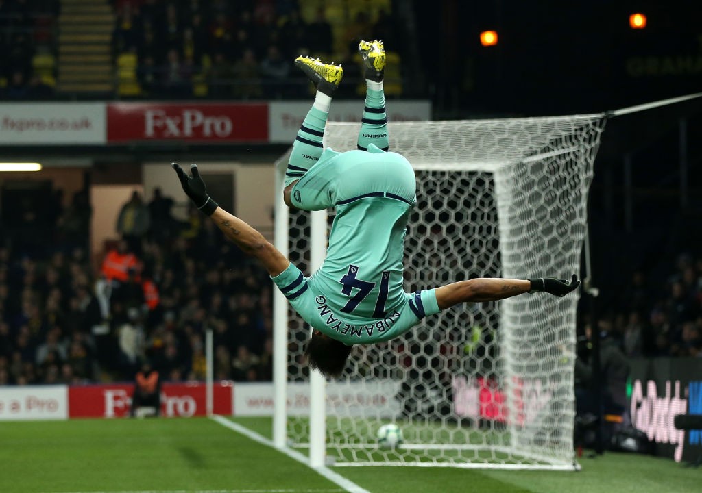 WATFORD, ENGLAND - APRIL 15: Pierre-Emerick Aubameyang of Arsenal celebrates scoring his side's first goal during the Premier League match between ...