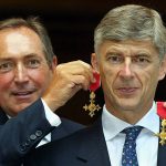 Gerard Houllier (L) of Liverpool holds his OBE medal as an earring on long-term friend and fellow manager Arsene Wenger of Arsenal, after being awarded their OBE medals at The Foreign Office in London 09 July 2003. The honor awarded by Foreign Secretary Jack Straw, is that of an officer in the Most Excellent Order of the British Empire. The British honors are awarded on merit for exceptional achievement of service to British interests. AFP PHOTO Adrian DENNIS / WPA POOL