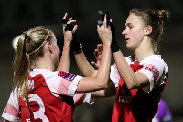 BOREHAMWOOD, ENGLAND - MARCH 14: Vivianne Miedema of Arsenal Women celebrates scoring a hat-trick, her side's fourth goal with team mate Beth Mead ...