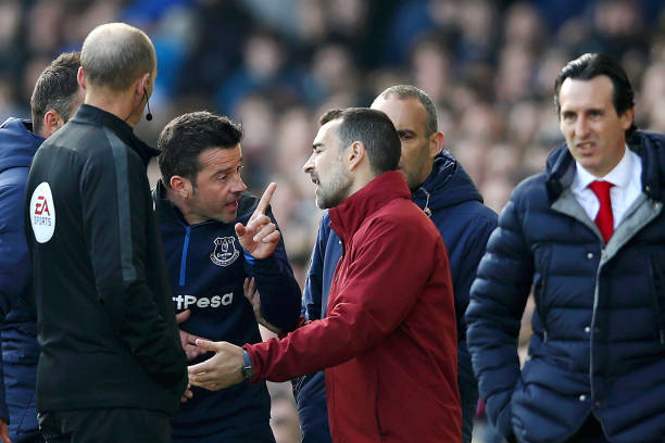 LIVERPOOL, ENGLAND - APRIL 07: Marco Silva, Manager of Everton argues with the Arsenal coaching staff during the Premier League match between Evert...