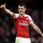 LONDON, ENGLAND - DECEMBER 02: Granit Xhaka of Arsenal celebrates his team's victory after the Premier League match between Arsenal FC and Tottenham Hotspur at Emirates Stadium on December 1, 2018 in London, United Kingdom. (Photo by Shaun Botterill/Getty Images)