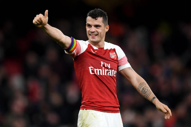 LONDON, ENGLAND - DECEMBER 02: Granit Xhaka of Arsenal celebrates his team's victory after the Premier League match between Arsenal FC and Tottenha...