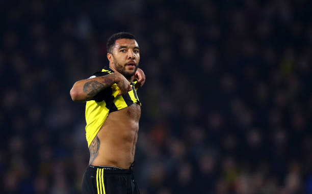 WATFORD, ENGLAND - APRIL 15: Troy Deeney of Watford leaves the field after being shown a red card for elbowing Lucas Torreira of Arsenal during the...