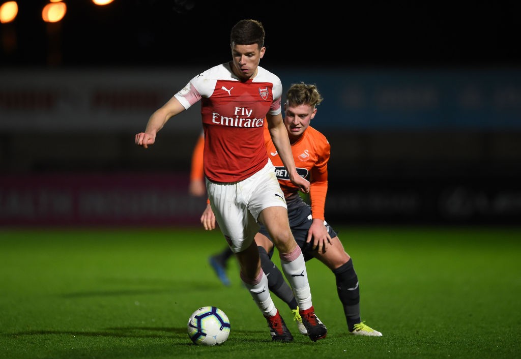 BOREHAMWOOD, ENGLAND - MARCH 04: Charlie Gilmour of Arsenal is challenged by Adam King of Swansea City during the Premier League 2 match between Ar...